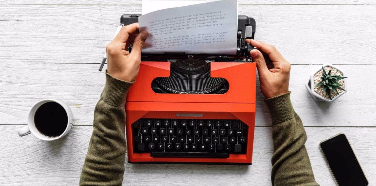 Red Typewriter, mug of black coffee